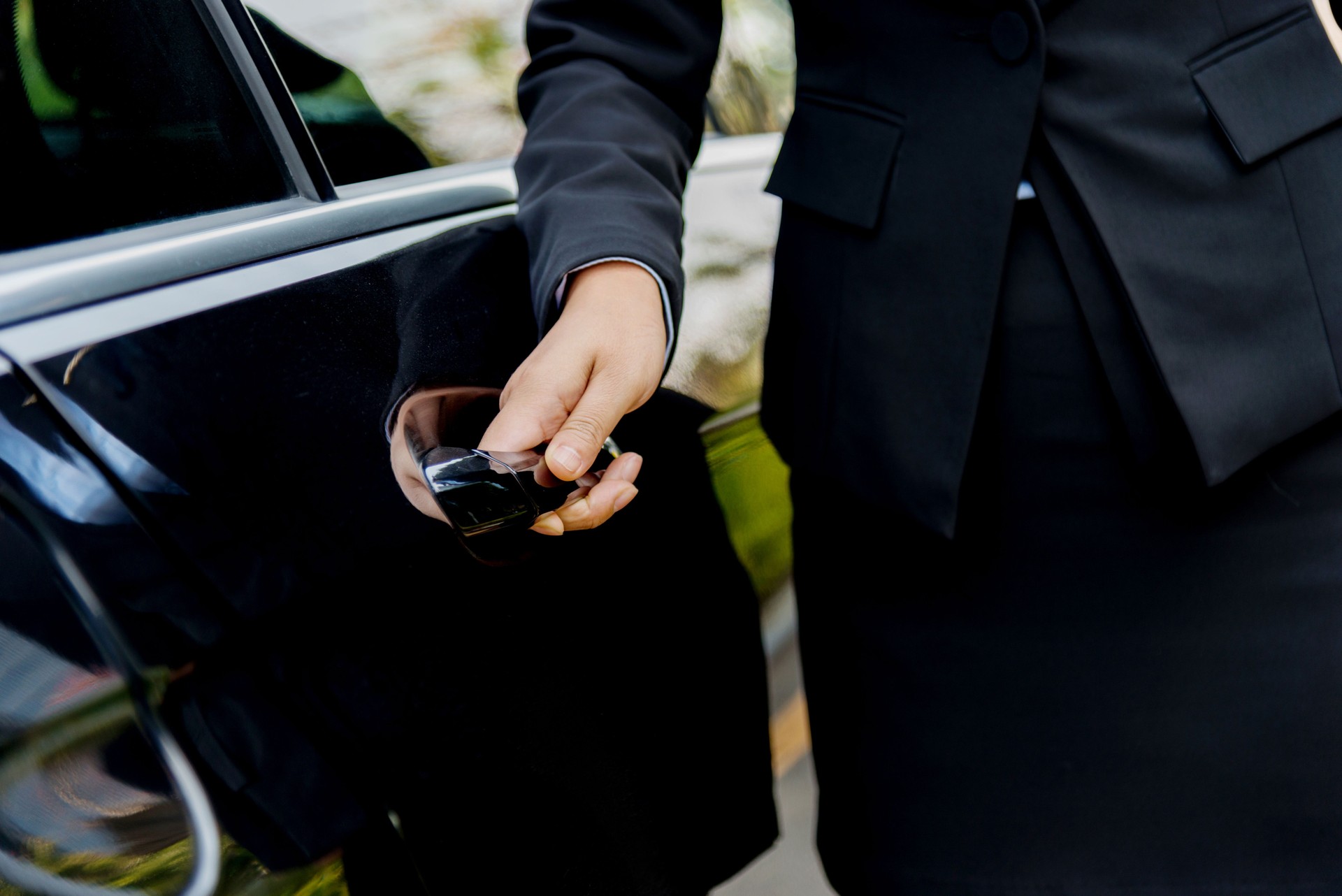 Chauffeur open car door